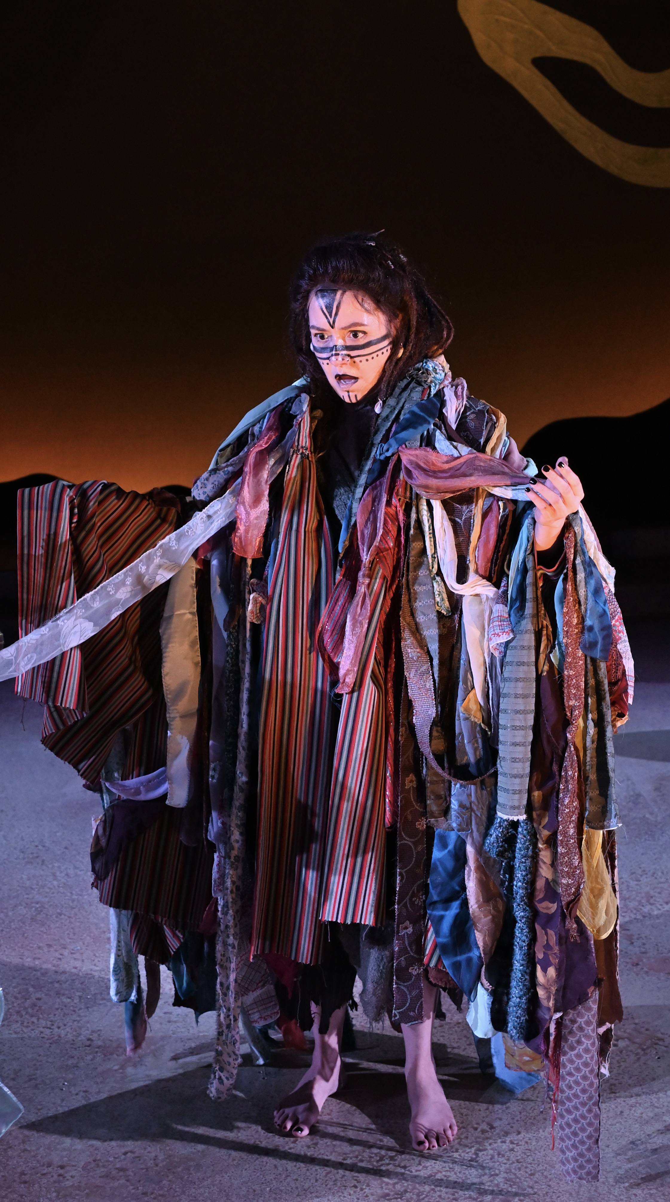 Gloria Vivica Benavides as Caliban in The Tempest, full-length stage portrait